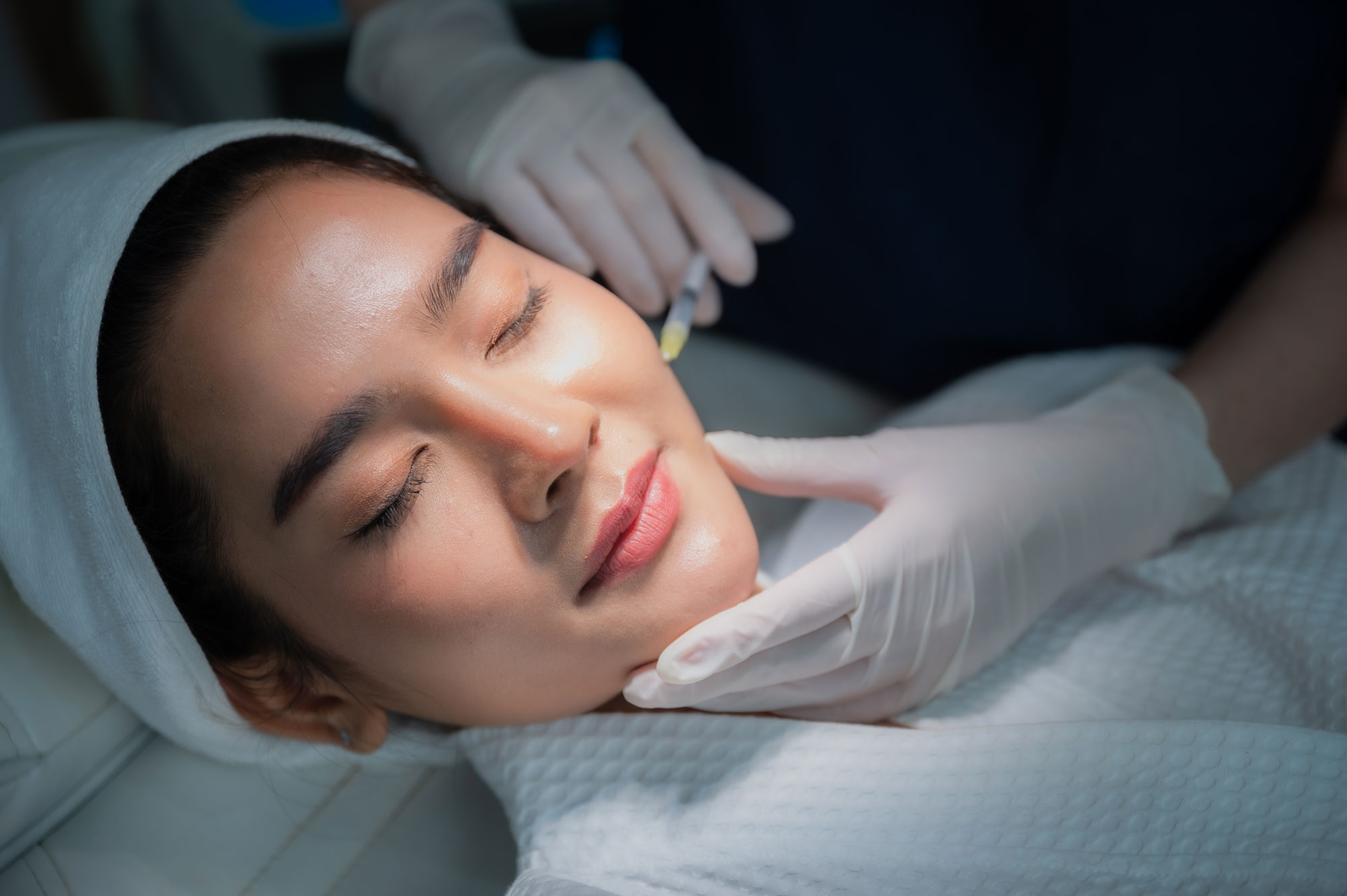 young-asian-woman-making-cosmetology-treatment-ski-2023-11-27-05-14-48-utc-(1)